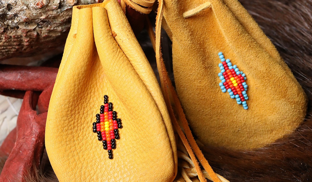 Picture of yellow medicine bags made of deer leather