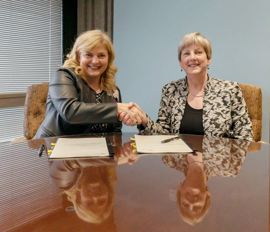 Picture of INTA President Tish Berard and CIPO's Commissioner of Patents, Registrar of Trademarks and Chief Executive Officer, Johanne Bélisle.