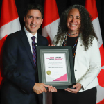 Tonja Armstrong-MacInnis receives a 2021 Prime Minister's Award for Excellence in Early Childhood Education from Prime Minister Justin Trudeau