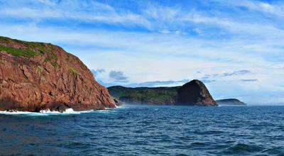 The view north along the coast from the afterdeck. Photo by Kai Boggild