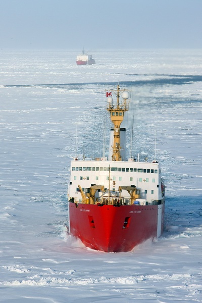 Louis breaking ice for the Healy for multibeam acquisition Photo Credit: Don Glencross, DRDC and Chris Swannell (Helicopter Pilot)