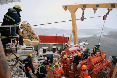 Deploying seismic array. Photo credit: Hans Böggild
